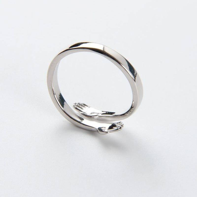Couple hug ring