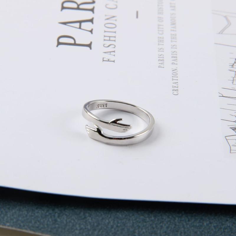Couple hug ring