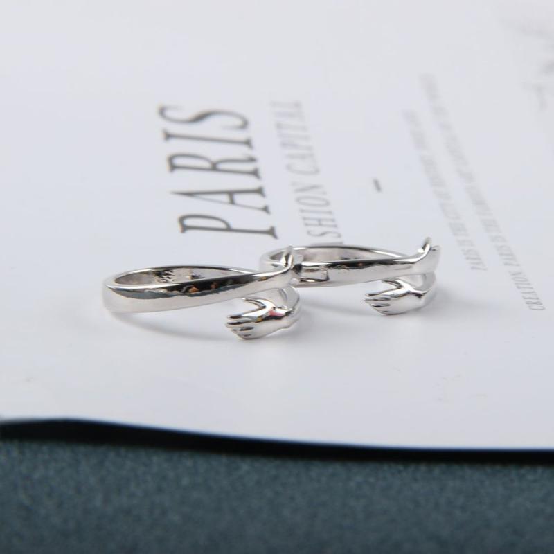 Couple hug ring
